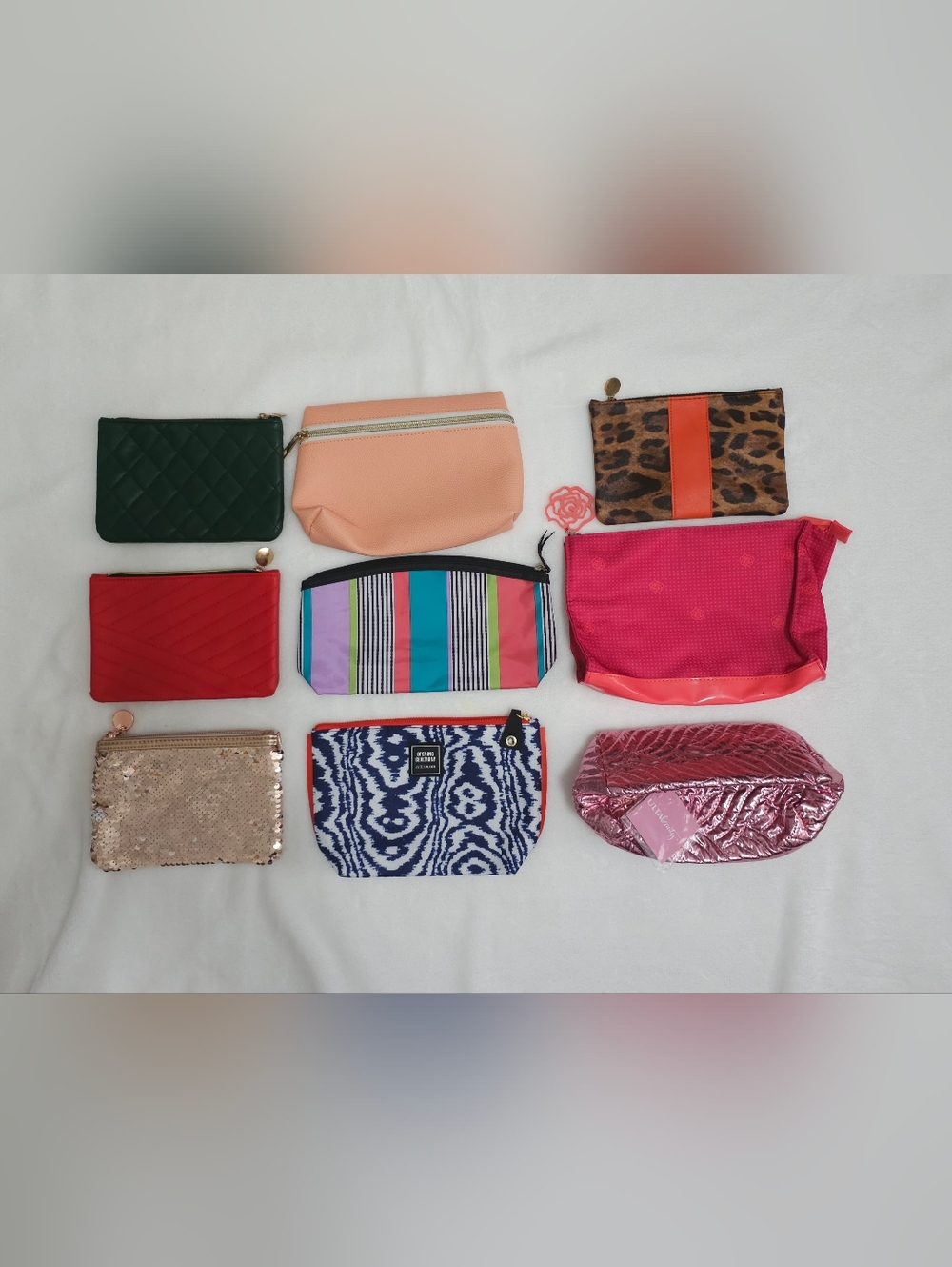 Nine Assorted Cosmetic Pouches - Price is Firm